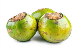 Delicious coconuts with rough brown shells and white flesh, ideal for tropical food themes and natural ingredient visuals, isolated on white background photo