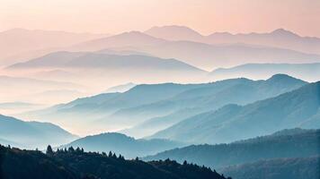 Majestic mountain range with misty layers in serene landscape for nature enthusiasts and photographers mist photo