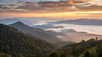 Breathtaking mountain landscape with golden sunrise over misty valleys for nature enthusiasts and travel bloggers mountain photo