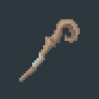 wooden staff in pixel art style with isolated background vector