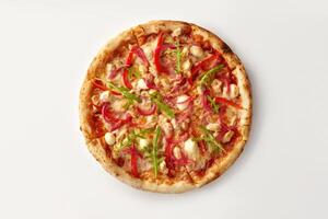 Delicious pizza with chicken, red onion, arugula, and mozzarella on white background photo