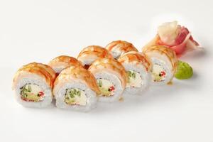 Delicious sushi rolls with shrimp and cream cheese filling on white background photo