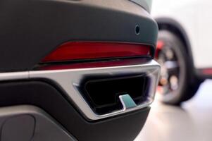 Close-up of a modern car exhaust pipe photo