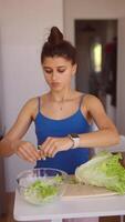 Preparation of a Fresh and Colorful Salad in a Bright and Inviting Kitchen Environment video