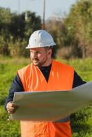 Building Engineer On The Green Grass photo