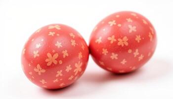 Two red Easter eggs with a painted pattern on a white background close up. photo. photo
