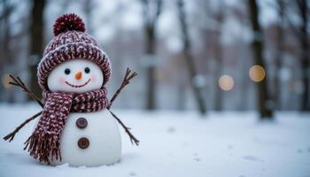 Winter holiday christmas background banner Closeup of cute funny laughing snowman with wool hat and scarf photo