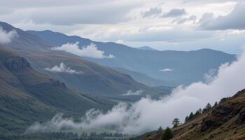 fog rolling over green scottish highlands photo