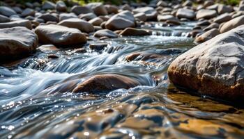 Crystal clear mountain stream flowing gently over smooth rocks, symbolizing purity, refreshment, and the sacredness of nature. photo