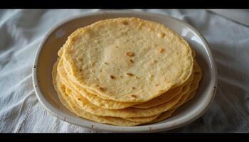 Stack of Corn Tortillas on Plate Ready to Eat photo
