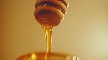 Honey Drips from a Dipper in a Delightful Flowing Motion photo