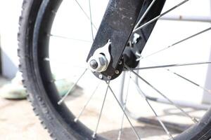 A CloseUp View of a Bicycle Wheel Hub and Its Spokes, Capturing Every Detail Clearly photo