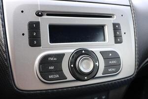 The modern car audio control panel showcases an impressive array of features and technology photo