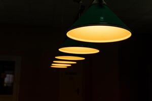 A row of lights hanging from the ceiling photo