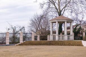 A gazebo in a park photo