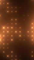 Radiant golden star pattern on a warm amber background, creating a festive and luxurious abstract texture video