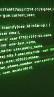 Blurred green matrix of programming code featuring visible user data fields, highlighting cybersecurity, data leaks, or digital privacy concerns video