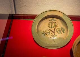 A bowl with a flower design on it photo