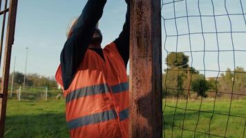 Working Builder In The Green Grass video