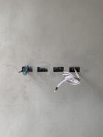 power electricity hub on wall background photo