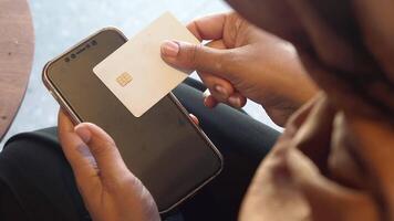 Payment process with a smartphone and a card in a modern setting video