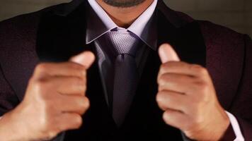 Dressed to impress at a formal event in a stylish suit video