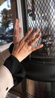 Warm hands by the fire in a cozy indoor setting on a chilly day video