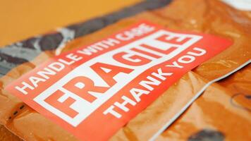 Handling fragile packages with care during delivery process video