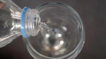 Pouring water into a glass for hydration and refreshment video