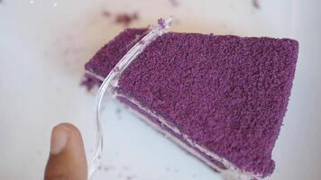 Delightful purple cake being served at a cafe in the afternoon video