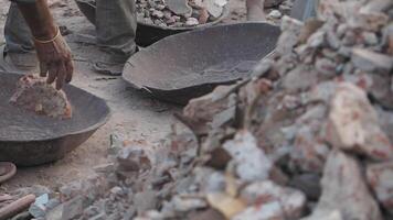 Construction workers sorting materials at a building site video