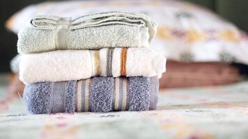 Towels neatly arranged on a bed in a cozy bedroom setting video