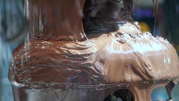 Chocolate fountain flowing at dessert event in downtown location video