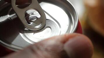 Enjoying a refreshing drink with a satisfying can opening experience video