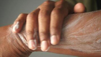 Applying moisturizer on skin for hydration and protection video