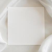 Empty white canvas with soft cloth background photo