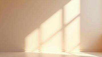 Illuminated shadows on an empty, beige wall. photo