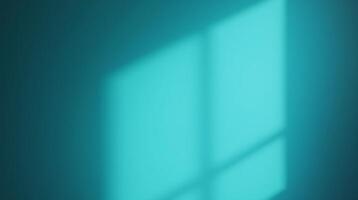 Calm, serene teal wall, with soft light shadows. photo