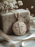 Intricately crafted first communion medal resting on a textured box adorned with delicate floral accents photo