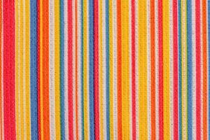 Microfiber cloth as a background macro photo. Microfiber fabric in colored stripes. photo
