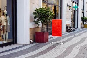 Retail storefront with a striking red sign and an inviting atmosphere for shoppers photo