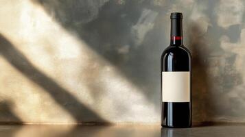 Wine bottle with blank white label on textured wall background, illuminated angled light beams photo