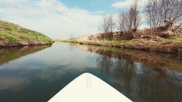 view of the water from the front of a kayak video