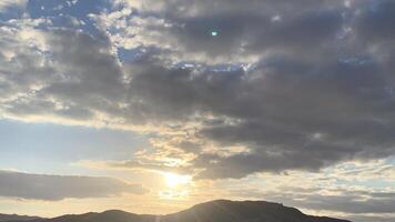 sunset over the mountains photo