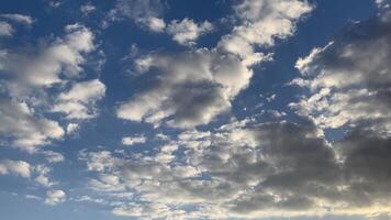 a view of the sky with clouds and a blue sky photo
