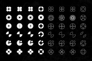 A set of different shapes and symbols on a black background vector