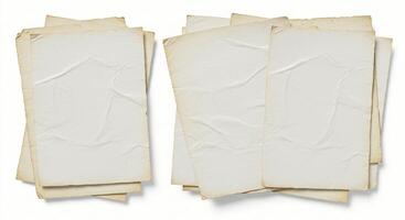 Old paper sheets isolated on white background photo
