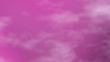 Gentle pastel pink background with abstract smoke swirls, creating a soft and elegant visual effect. video