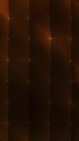Seamless vertical 4K animation of elegant golden lines and dots flowing smoothly on a dark background. Suitable for luxury branding and corporate visuals. video