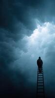 person stands on ladder reaching into dramatic clouds photo